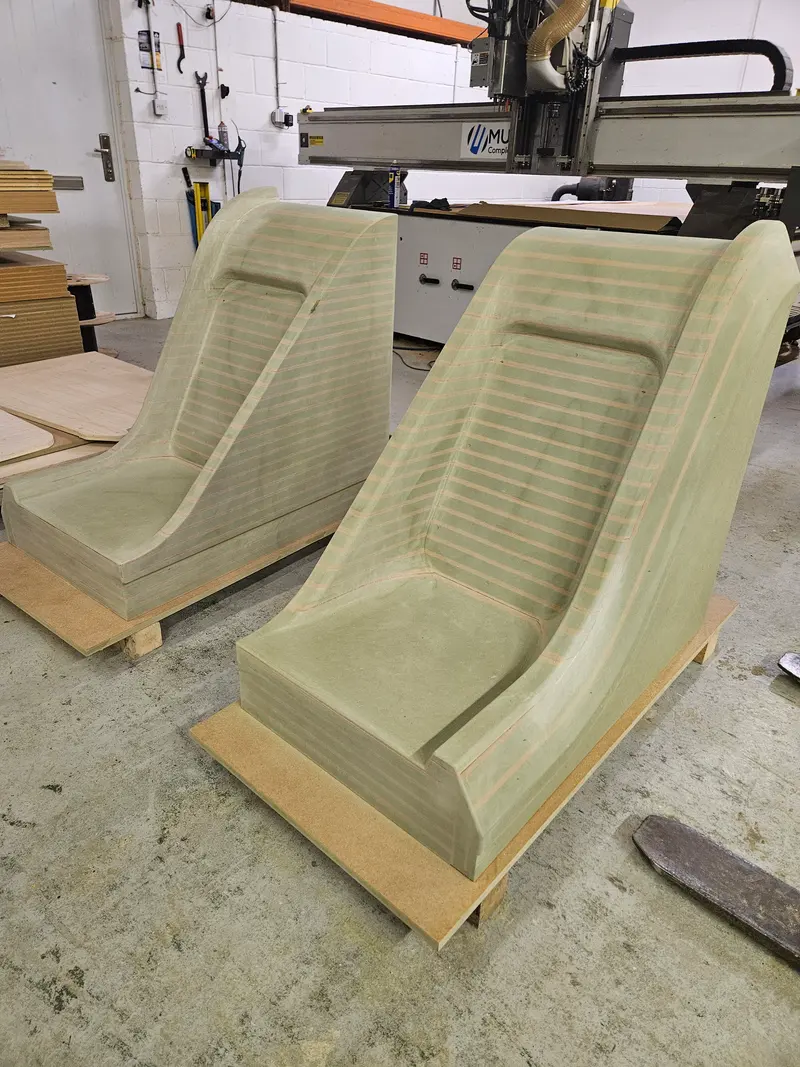 Two CNC-machined patterns for a new truck body concept on the workshop floor